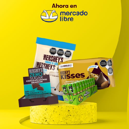 Se muestra un pequeño empaque exhibidor de Hershey Zero Sugar, un empaque de Cookies 'n' Cream, un empaque de Hershey's Kisses Almendra y un empaque de 18 Pelonetes, con la marca de mercado libre en la parte superior de la imagen.